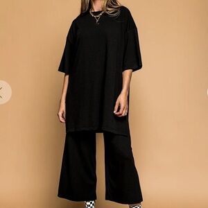 Dressed in LaLa Lex Ribbed Playsuit in Black